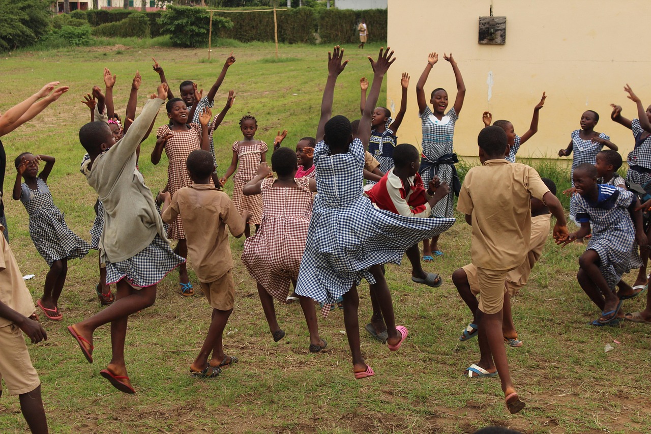 Children playing outside at a school in Africa