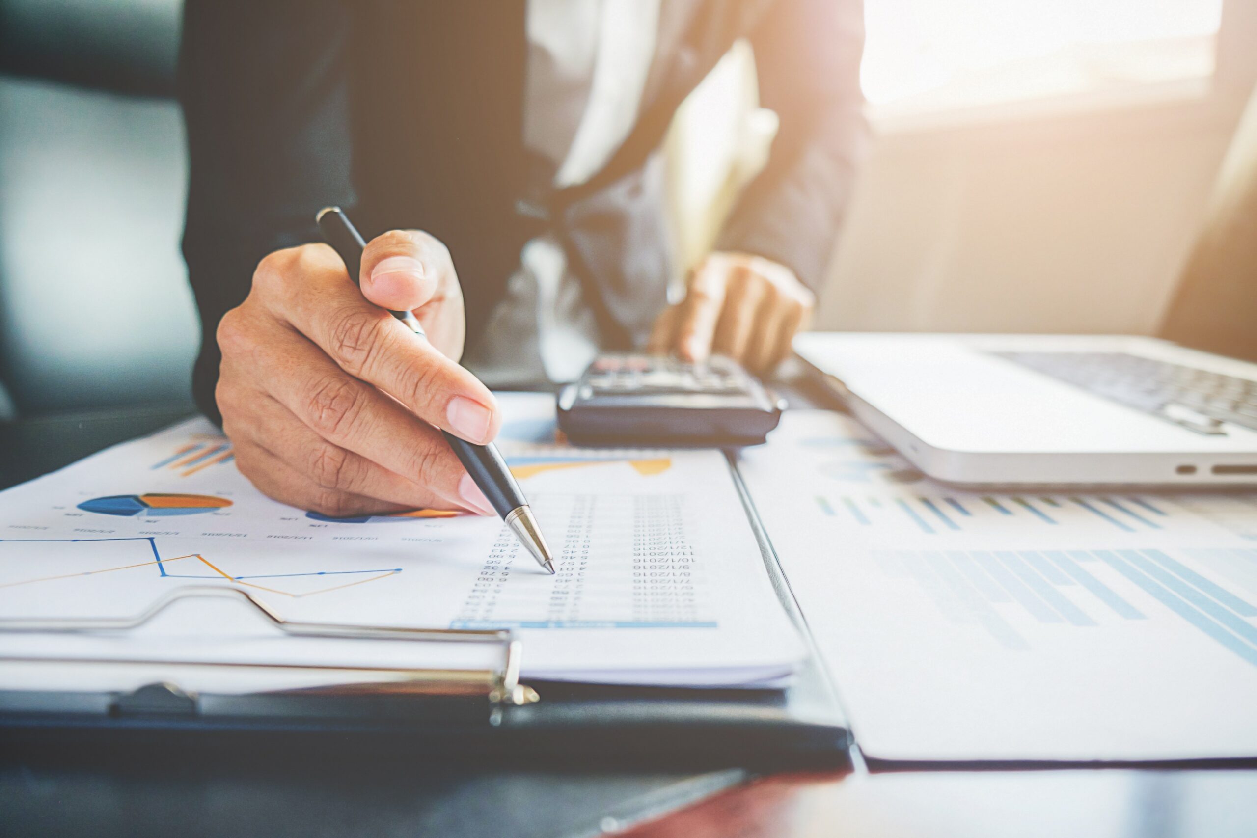 Senior finance leader reviewing financial reports and strategy, representing global non-profit finance leadership, planning and governance.